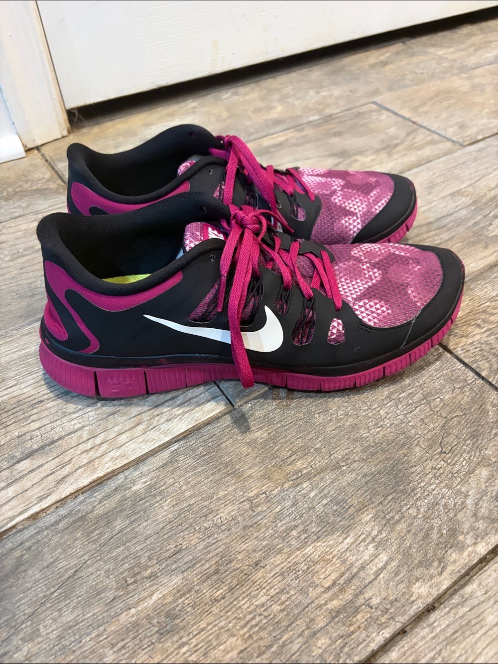Nike Women’s Free 5.0 Pink and Black Training Sneakers with White Swoosh